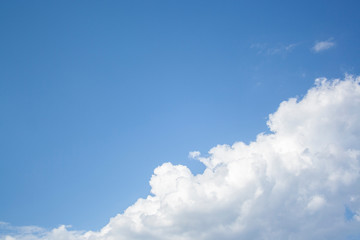 White clouds high in the sky at windy winter day background