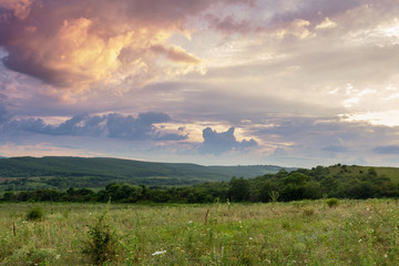 landscape bright colorful clouds in the light of the sunset