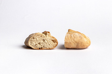 Freshly baked bread rolls isolated on white background.