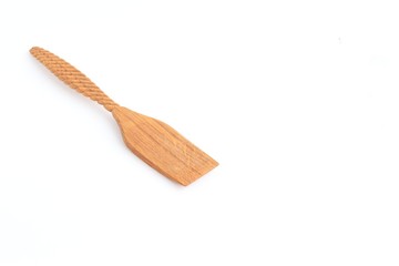 Kitchen wooden paddle made of oak for cooking.
