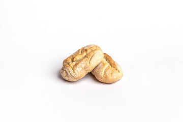 Freshly baked bread rolls isolated on white background.