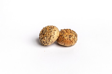 Freshly baked bread rolls isolated on white background.