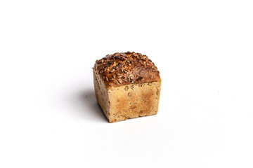 Fresh home-made bread with a crispy crust, on white background.