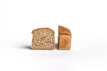 Fresh home-made bread with a crispy crust, on white background.