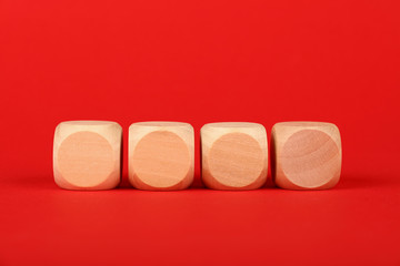 Blank wooden cube signs over red background