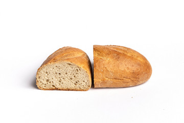 Fresh home-made bread with a crispy crust, on white background.