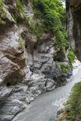 Fototapeta na wymiar Dark river in taroko national park after rain storm in taiwan.