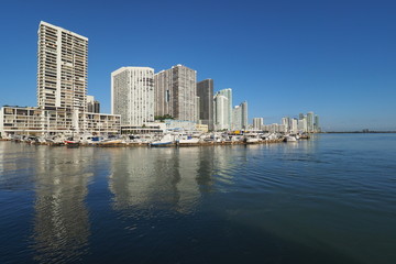 Fototapeta na wymiar Residential towers on the Intracoastal Waterway and Biscayne Bay, Miami, Florida, on a calm autumn morning.