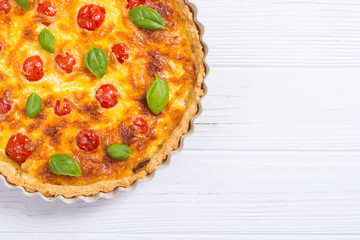 Chicken Quiche lorraine with mushrooms , tomatoes and cheese
