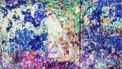 plastered wall, covered with old multi-colored paint with bright blue, green, purple hues