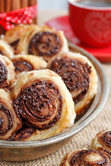 Palmier biscuits - french cookies made of puff pastry and chocolate