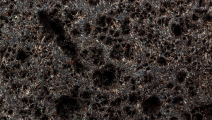 Dark rough stone surface background