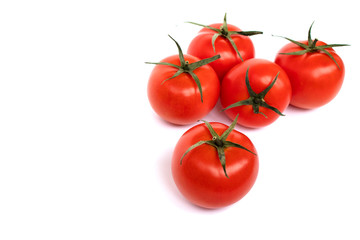 Group of fresh cherry tomatoes isolated on white background
