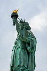 Fototapeta premium Statue of Liberty close up in a sunny day, blue sky in New York - Image
