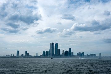 Fototapeta premium Skyline and modern office buildings of Midtown Manhattan viewed from across the Hudson River. - Image