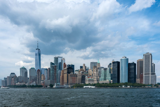 Skyline and modern office buildings of Midtown Manhattan viewed from across the Hudson River. - Image