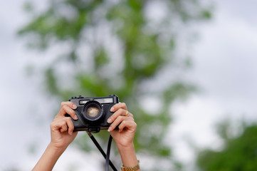 Woman and camera Female photographers are shooting happily. Travel concept