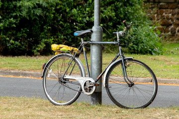 Fototapeta premium Yellow bag on bike