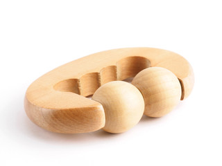 Wooden body massager on white background