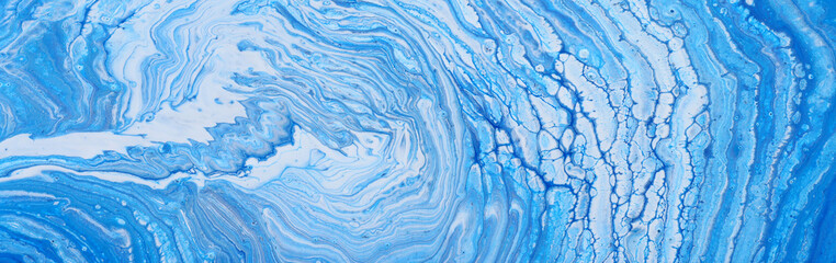 photography of abstract marbleized effect background. Blue and white creative colors. Beautiful...