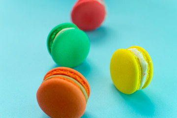 Close-up shot of colored macaroons in different position