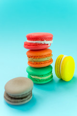 Close-up shot of colored macaroons in different position
