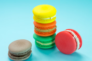 Close-up shot of colored macaroons in different position