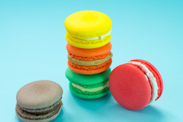 Close-up shot of colored macaroons in different position