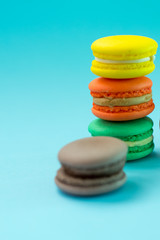 Close-up shot of colored macaroons in different position