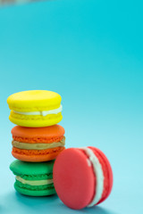 Close-up shot of colored macaroons in different position