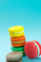 Close-up shot of colored macaroons in different position