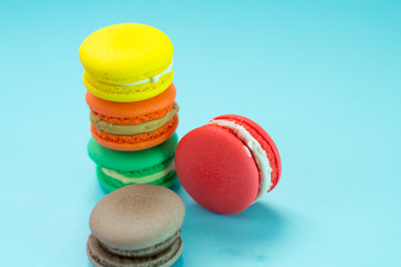 Close-up shot of colored macaroons in different position
