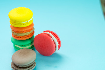 Close-up shot of colored macaroons in different position