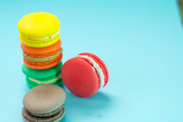 Close-up shot of colored macaroons in different position