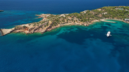 Aerial drone photo of rocky peninsula in Astir area or Asteras, Vouliagmenis, Attica, Greece