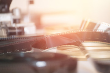 Cinema film reel or filmstrip on a cutting table
