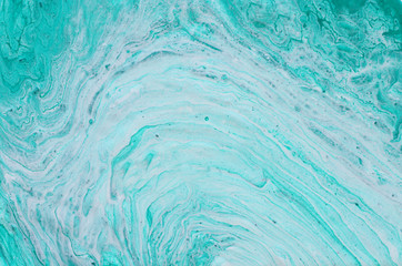 photography of abstract marbleized effect background. mint, green and white creative colors. Beautiful paint. banner