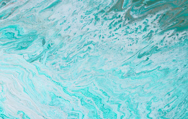 photography of abstract marbleized effect background. mint, green and white creative colors. Beautiful paint. banner
