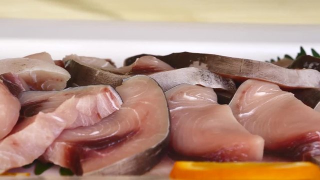 swordfish cut with basil and lemon, buffet composition