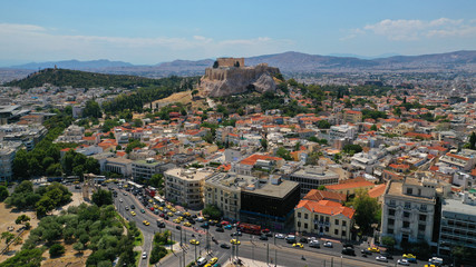 Fototapeta na wymiar Aerial birds eye view photo taken by drone of iconic Acropolis hill and the Parthenon, Athens historic centre, Attica, Greece