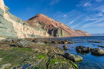 cliff line with multicolored rock formation is the Bay of Cortez, Mexico