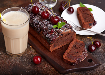 Chocolate brownie cake with cherries. Delicious homemade sweet dessert. 