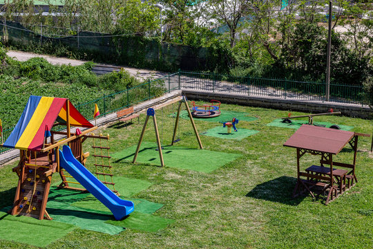 Bacoli, Naples, Italy May 25, 2019. In the park of the children's rides, the slide, the swing.