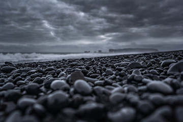 Fototapeta premium Black beach in Iceland with a dramatic sky