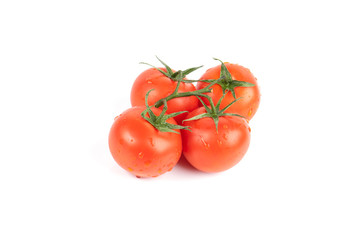 Fresh tomatoes isolated on white. With clipping path.
