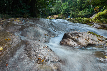 Naklejka na ściany i meble Beautiful Jungle Landscaspes and blue pools of Warter at Reach Falls Jamaica