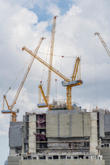 crane near building on Cloudy sky background