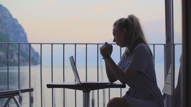 Woman Working on Laptop