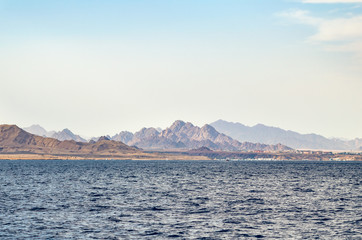 Mountain landscape with blue water in the national park Ras Mohammed, Egypt.