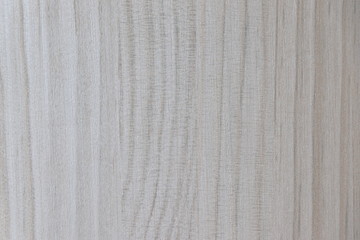 The texture of the white laminate natural wood background.